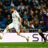 Suarez double downs Madrid to send Barca into Cup final