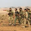 Kurdish forces withdraw from border region in North Syria