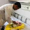 Lao new-born flown to Hanoi for heart operation