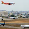 Workers take flights home for Lunar New Year