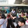 Bus stations crowded as people leave Hanoi for Hung Kings commemoration holiday