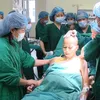 Vietnamese cancer woman risks life to give birth