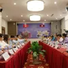 Vietnam, Laos boost cooperation in trade-industry, energy, mining