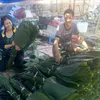 Dong leaf market in Laos reminds people of vietnamese Tet