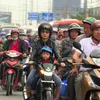 Heavy holiday traffic blocks highways into Hà Nội, HCM City