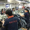 High-level Swiss delegation visits garment factory in Đồng Nai