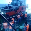 Vietnamese navy rescue Malaysian drifted barge
