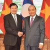 Vietnamese, Lao PMs: Inter-gov’t committee meeting a success