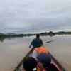 Rescue teams approach isolated power plants by waterway, road