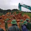 Rescue work at landslide site continues overnight, 18 bodies retrieved