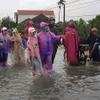 Tropical storm Etau kills two as Vietnam prepares for Typhoon Vamco