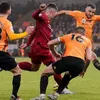 Liverpool move towards title with 2-1 win at Wolves