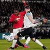 Man United beat Rooney's Derby 3-0 to reach Cup quarters