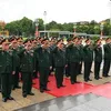 Delegates of the Party Congress of the Vietnam People’s Army pay tribute to President Ho Chi Minh