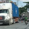 Lack of parking space for trucks in HCM City hits transport companies