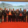 EVN and Laos’ Phongsubthavy Group sign power purchase agreements for two hydropower projects