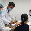 Vietnam tests COVID-19 vaccine with highest dosage on three people