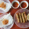 Ha Tinh’s unique steamed rice rolls with spring roll stuffing