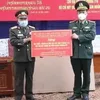 Quang Binh’s border guards donate medical supplies to Lao counterparts