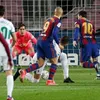 Messi double helps Barca see off Elche