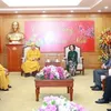 Politburo member Truong Thi Mai receives Buddhist and Catholic delegations