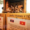 Vietnam offers Laos further aid to cope with COVID-19