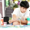 Kid painter sells artworks to raise VND3bln for COVID-19 fight