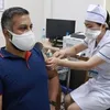 Fifty foreign reporters in Vietnam get vaccinated against COVID-19