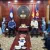 Laos joins hands with Vietnam to fight COVID-19