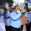 President Nguyen Xuan Phuc shares in difficulties facing Ho Chi Minh City residents