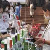 Tet fair displays organic farm products and Vietnamese specialties