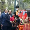 State leader joins ethnic groups in spring festival