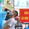 Vietnam reports additional 14,835 COVID-19 cases