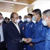 President presents gifts to workers at Binh Son Refinery Plant