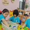 Kindergarten students in Hanoi return to school