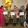 Peacekeeping officers present souvenirs to Vietnam Women's Museum