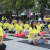 Nearly 1,000 people join a mass yoga performance in response to International Day of Yoga 2022