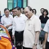 President visits garment production factory in Hai Phong