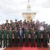 Vietnamese defence minister visits Vietnam-Laos fighting alliance monument