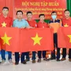 10,000 national flags presented to Tra Vinh fishermen