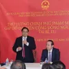 PM Chinh meets Vietnamese community in Belgium