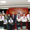 Scholarships given to disadvantaged oversea-Vietnamese students in Laos