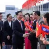 President arrives in Vientiane, beginning official visit to Laos