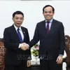 Deputy Prime Minister Tran Luu Quang receives Lao Minister of Home Affairs