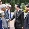 President Vo Van Thuong meets foreign, Vietnamese scientists