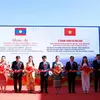 Vietnamese corporation presents apartment building to Lao province