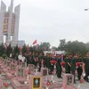 Nghe An reburies martyrs' remains repatriated from Laos