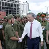 President attends debut of grassroots security and order protection force in HCM City