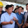 Investment minister inspects projects in southern Laos