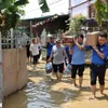 More assistance delivered to typhoon, flood victims